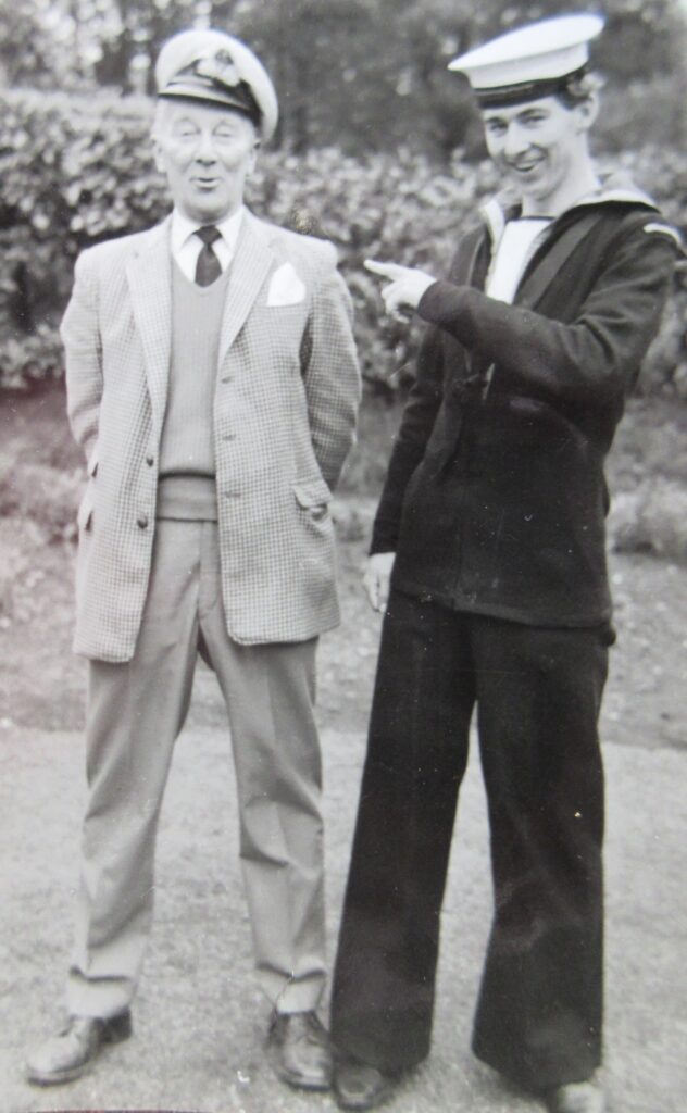 Mike in naval cadet uniform with his father