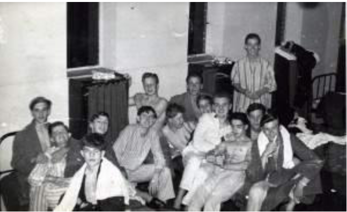 Boys relaxing in a school common room
